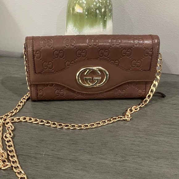 Gucci Brown Embossed Leather Clutch with Gold Chain - Picture 1 of 12